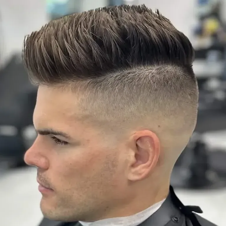 Kid getting a haircut at Next Level Barber Shop, Cape Coral FL